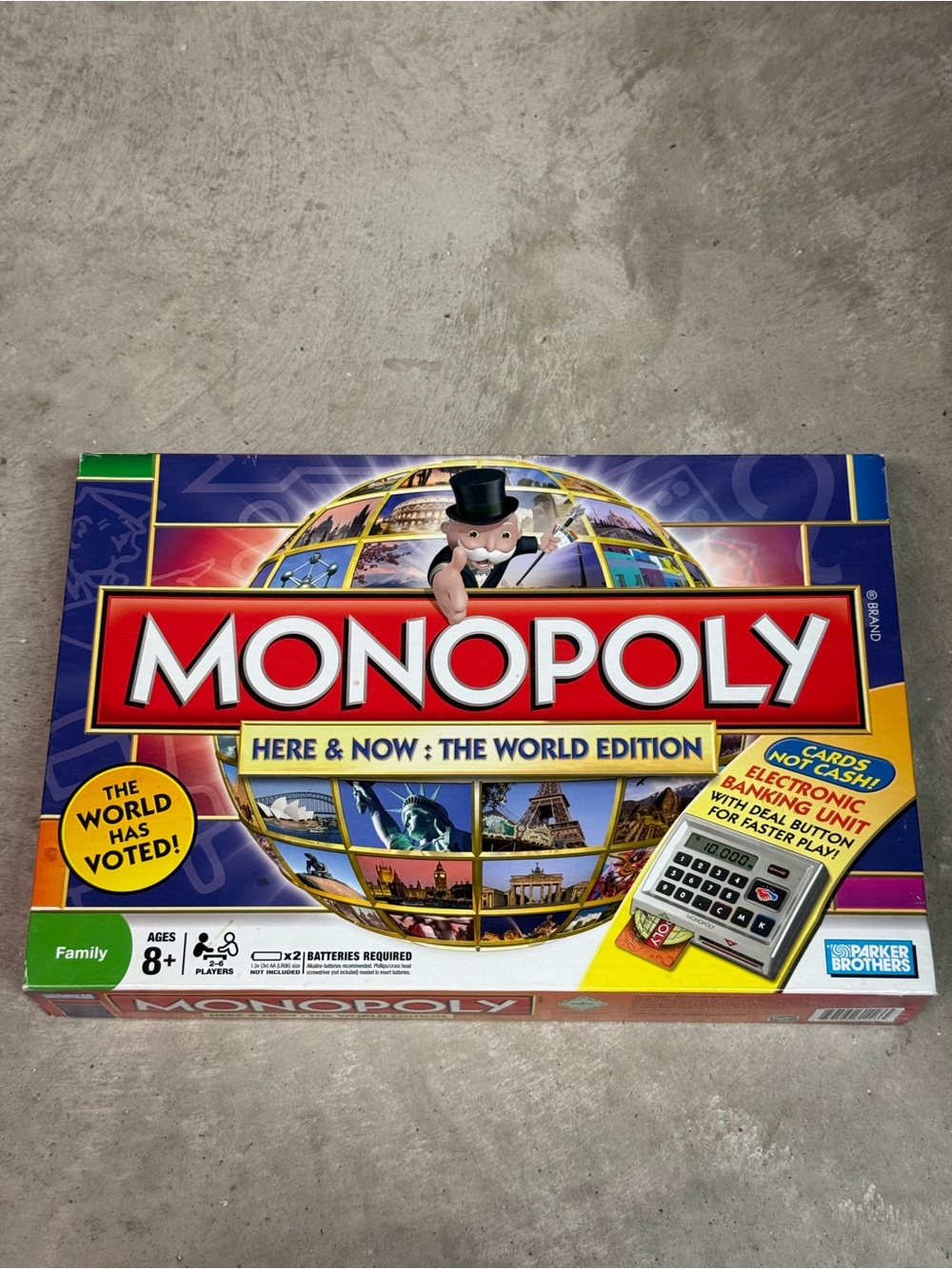 Hasbro Monopoly Here & Now Board Game - Red, Blue, Yellow